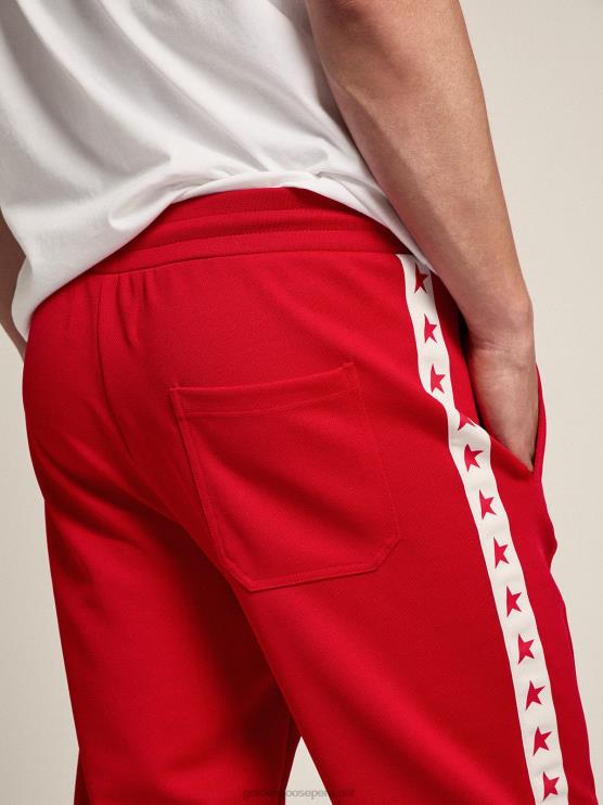 FDVPX756 Golden Goose hombres joggers rojos con estrellas rojas en los costados