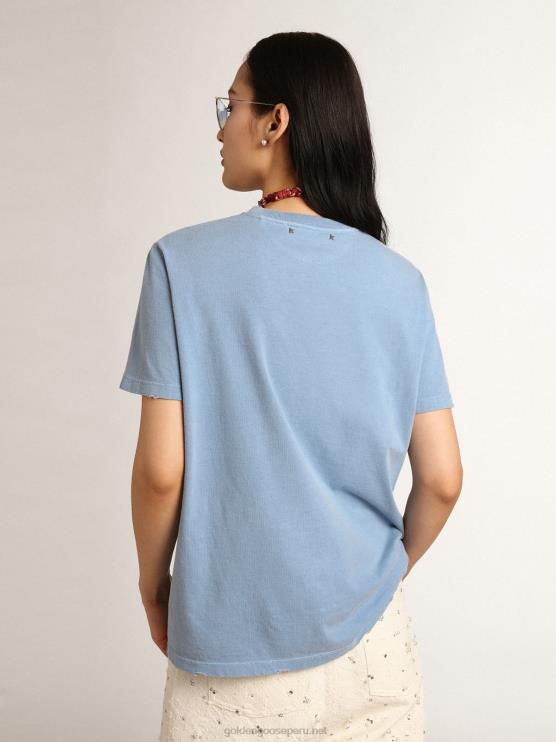FDVPX1000mujer Camiseta con efecto envejecido de la colección Journey azul puerto con letras doradas tono sobre tono.