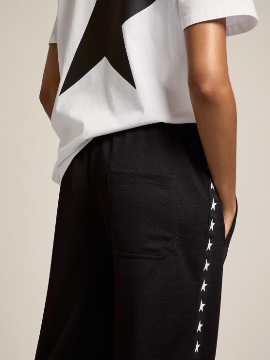 FDVPX1057 Golden Goose mujer joggers negros con estrellas blancas en los costados
