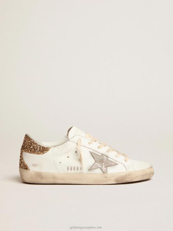 FDVPX6 Golden Goose mujer zapatillas super-star con estrella de piel plateada con estampado de serpiente y refuerzo del talón con purpurina dorada