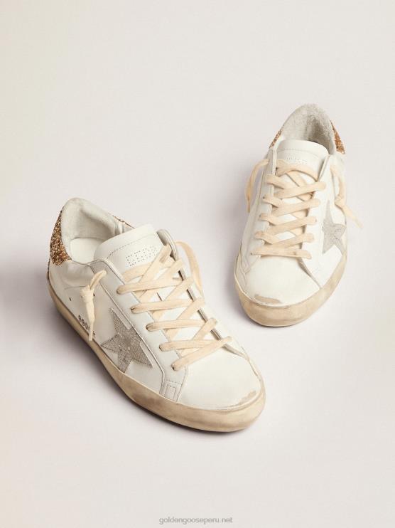 FDVPX6 Golden Goose mujer zapatillas super-star con estrella de piel plateada con estampado de serpiente y refuerzo del talón con purpurina dorada