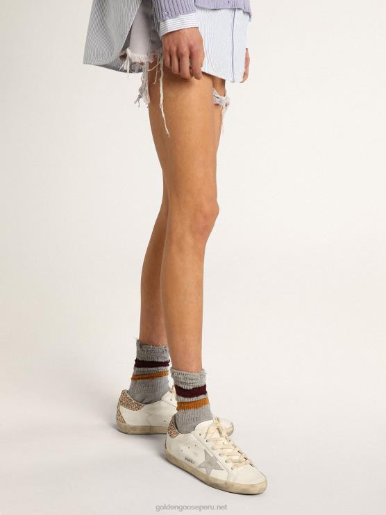 FDVPX6 Golden Goose mujer zapatillas super-star con estrella de piel plateada con estampado de serpiente y refuerzo del talón con purpurina dorada